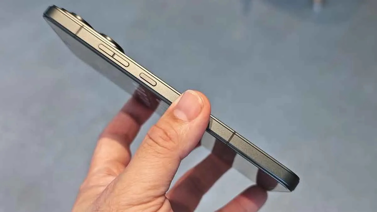 Lenovo Legion Y70 slim flat aluminum side profile showing power button, volume keys, and antenna bands